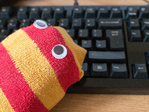 1200px-Sock_puppet_and_keyboard.jpg